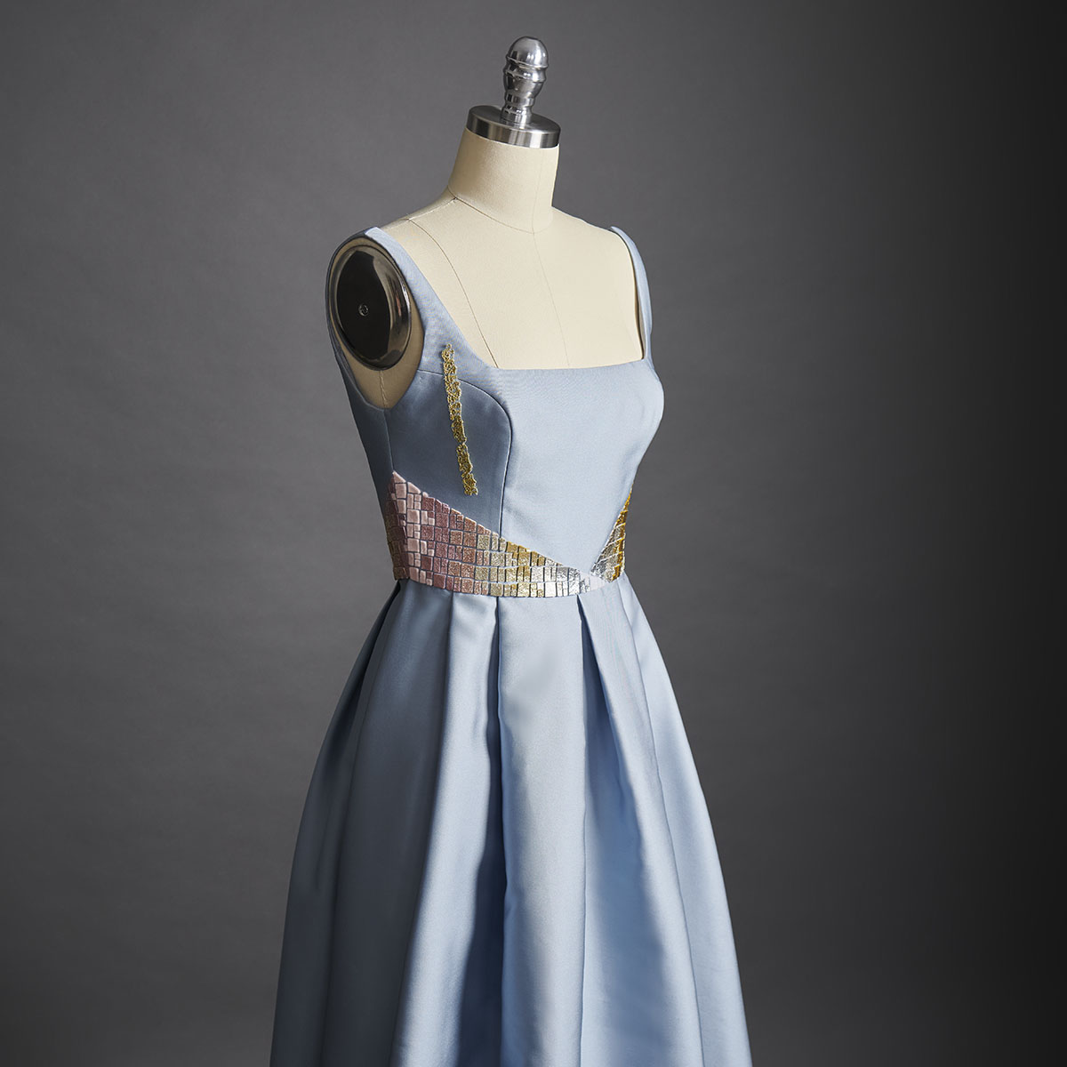 Reminiscent of a shimmering mosaic, this silk pale blue taffeta dress is embellished with hand-cut tesserae and the designer's signature metallic thread. - DELPHINE GENIN